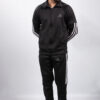 model wearing black tracksuit in pakistan