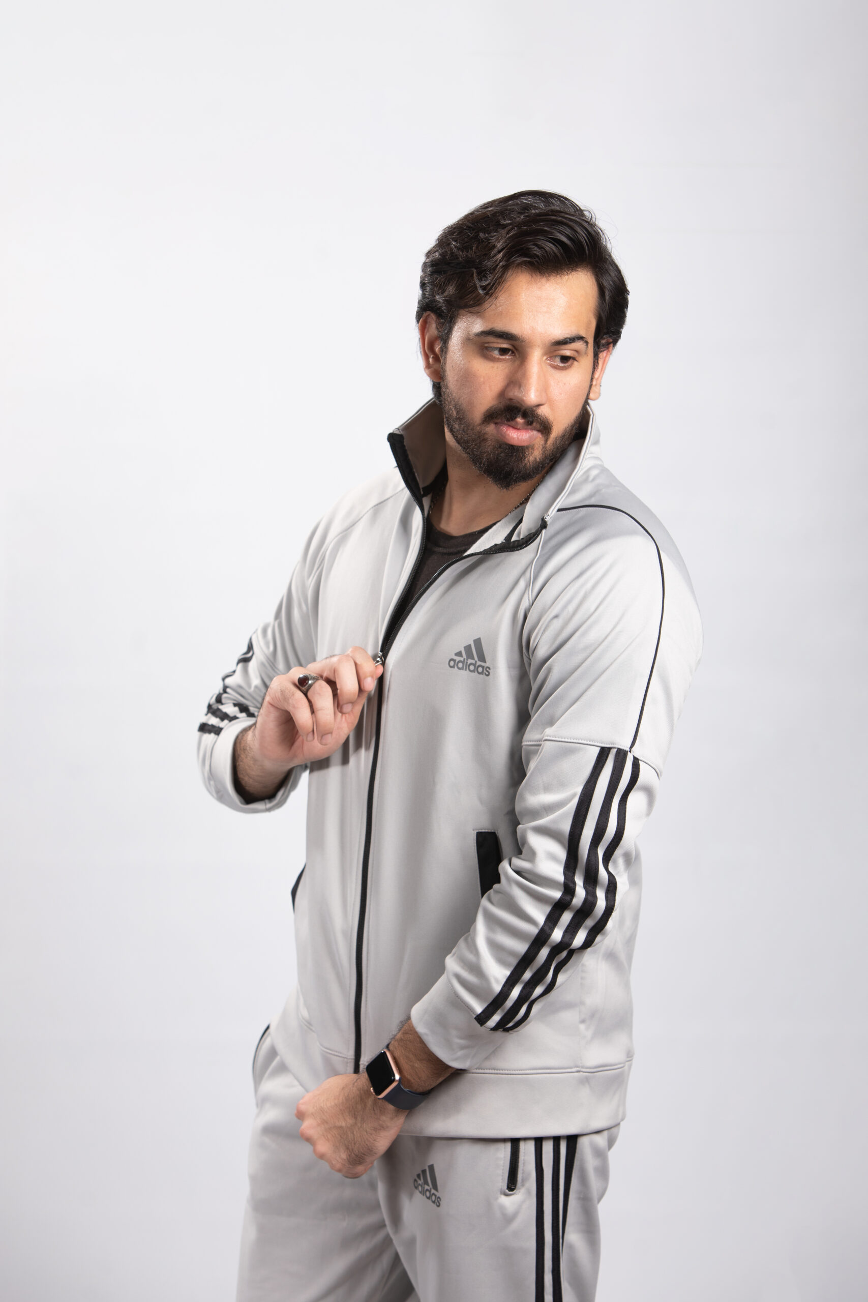 model wearing grey tracksuit front 2